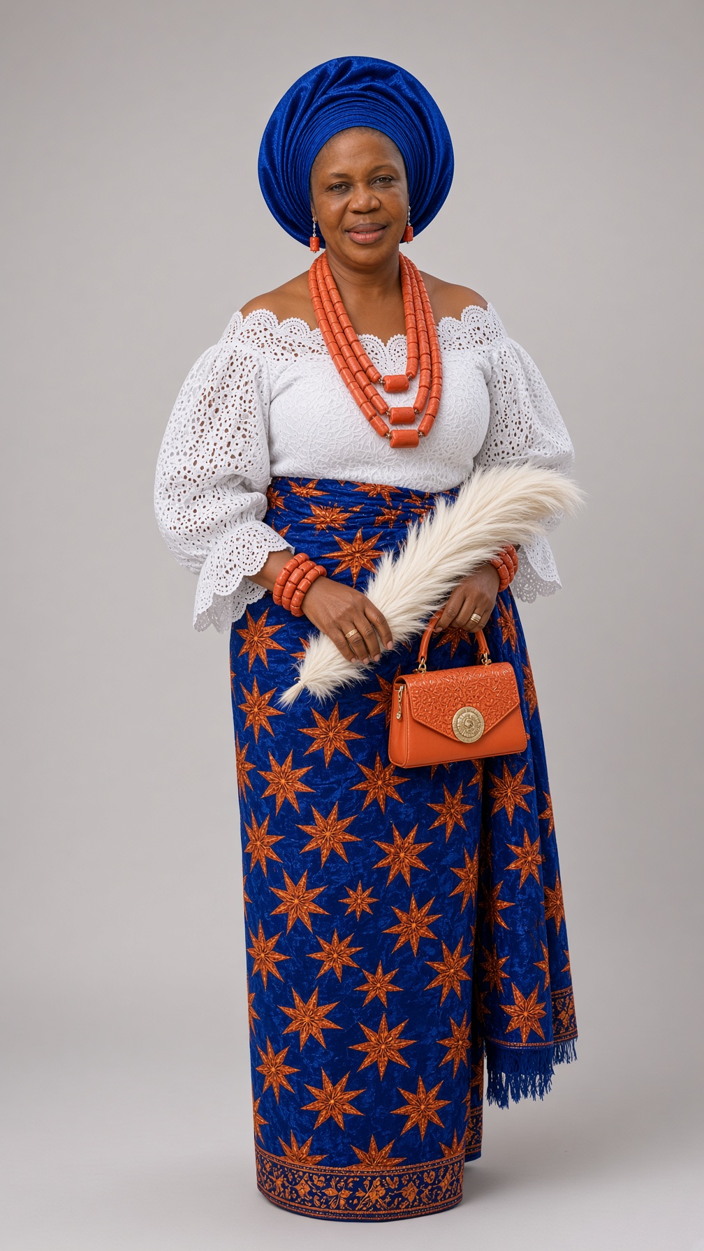 Victoria in royal blue traditional attire